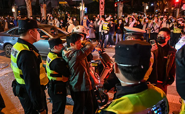 Covid protests flare across China as Clashes erupt in Shanghai