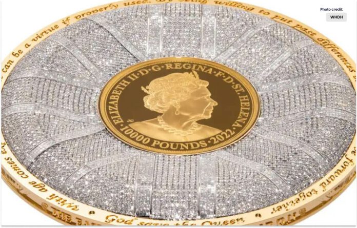 A gold basketball-sized coin commemorating Queen Elizabeth